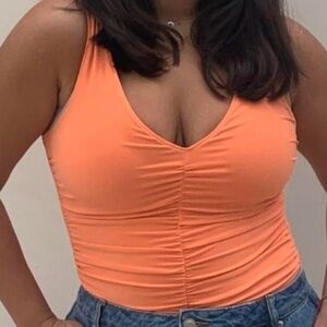 {{BNWT} Ruched V-Neck Sleeveless Thong Bodysuit in Gorgeous Orange.